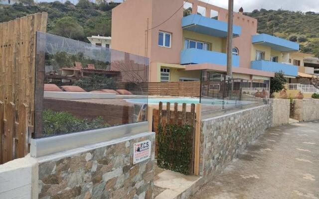 Beach front apartment with swimming pool