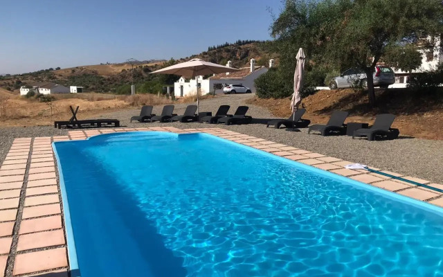 Casa Grande / Rosas Cantares