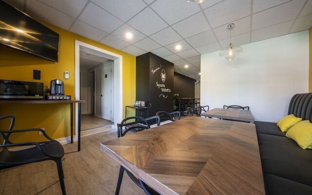 Square Victoria Maison Hôtelière