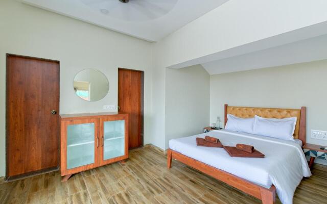 SaffronStays Coral Hues