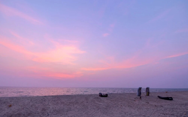 Amare Holiday Beach Resort By OYO Rooms