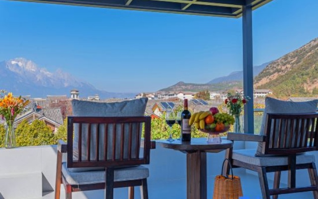 Qianshan Muxue · Sun Goldens · Yulong Snow Mountain View · Golden Snowscape Designer Lodge – Outside – Lijiang
