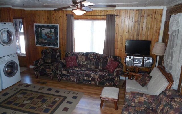 Chalets & appartements Au Chant De La Rivière