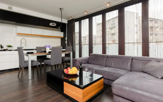 Warsaw Riverside Apartment by Renters