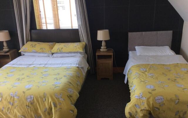Coach House Suites