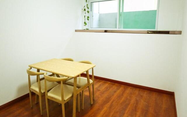 Shell Xinzhou Xinfu District Railway Station Hotel