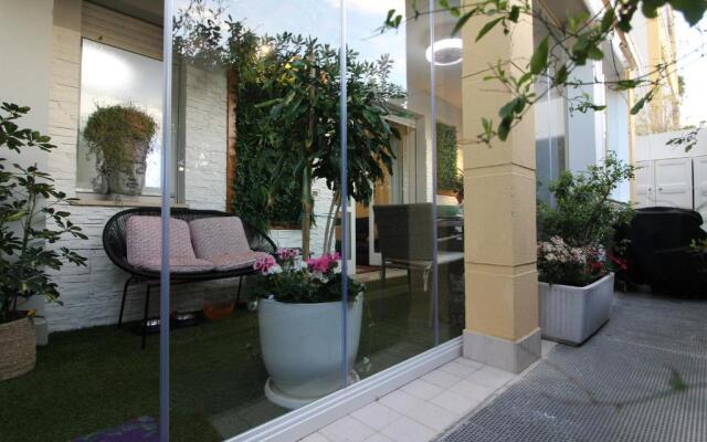 Cozy apt 10 mins walk from Poetto + terrace