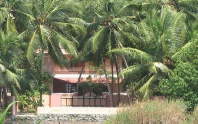 1 BR Guest house in Vazhamuttam, Kovalam (47AC), by GuestHouser