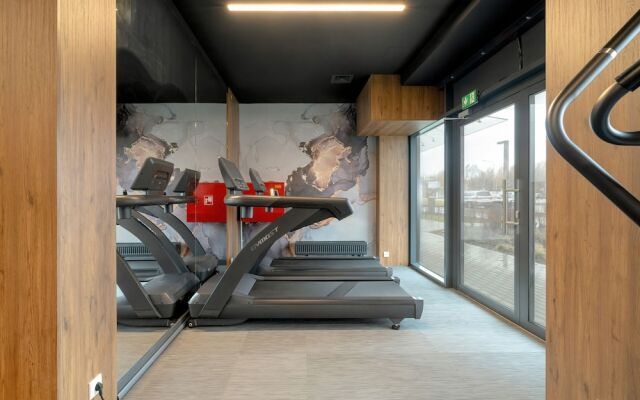 Minimalist Studios in Poznań by Renters