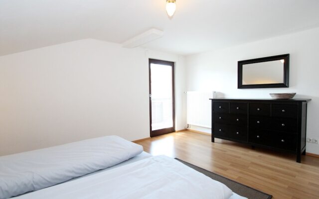 Quaint Chalet in Kirchberg with Terrace, Garden, Ski Storage