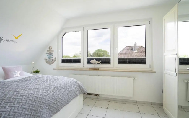 Badeweg 4 Sandkorn 3