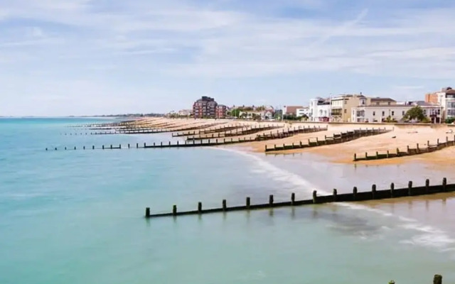 Absolute Beachfront With Decked Garden Oasis and Views