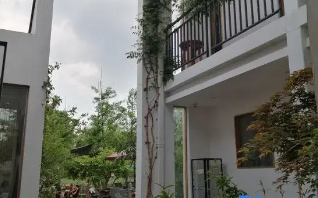 Shuying Courtyard Homestay (Sansheng Flower Valley Xingfu Meilin)