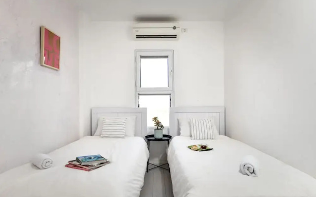 Modern Gem with Stunning Balcony by Sea N Rent