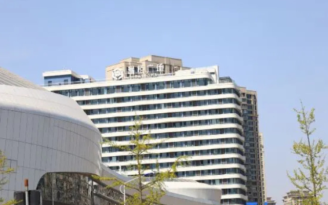 Muhai Lvsu Seaview Apartment (Development Zone Shibeiwan Water Park Branch)