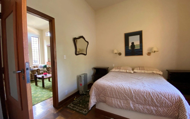 Casa com forno de pizza e vista para as montanhas