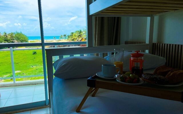 Apto vista mar incrível por Be My Guest