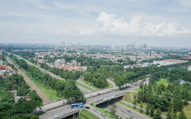 Cozy 2BR Apartment at Tuscany Residences With Garden View