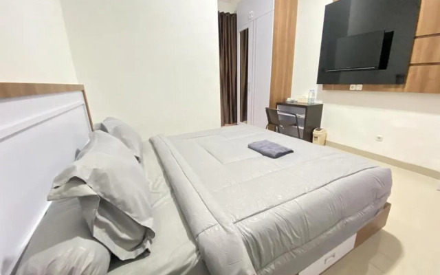 MJ Guest House Pusat Kota Malili Mitra RedDoorz