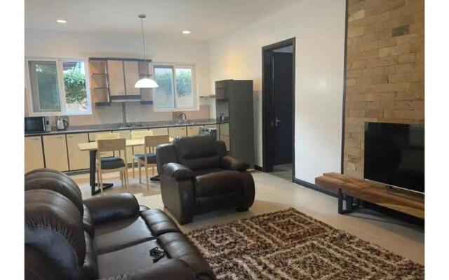 Entire 2 bedroom house with free wifi in Masaki