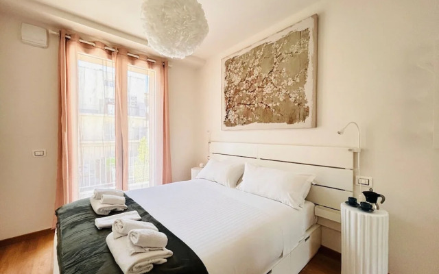 Moderno Bilocale con Terrazzo e Parcheggio