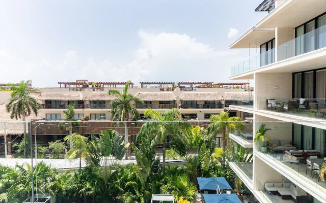 Contemporary Design Oceana 422 Playa del Carmen Condo by RedAwning