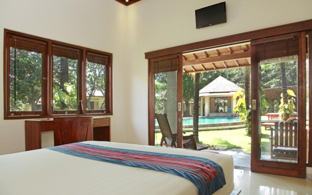 Puri Rinjani Bungalows – Guest Rooms – Kuta