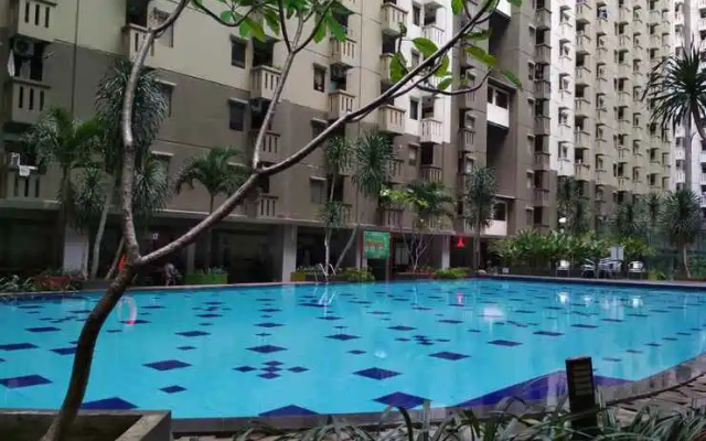 3BR Gateway Cicadas Ahmad Yani Apartment By Travelio