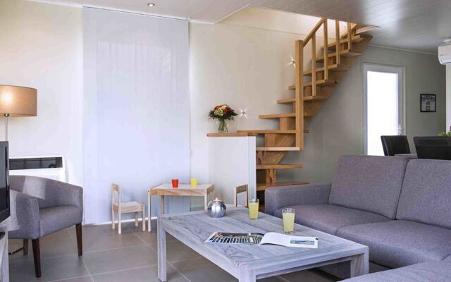 Child-friendly villa with stove, located in a lake area