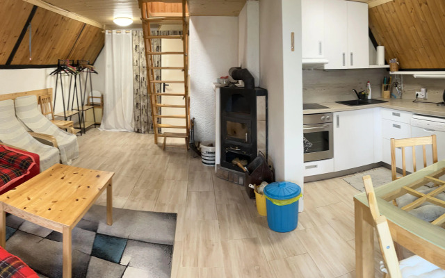 Nice holiday home with fireplace in the Ore Mountains only 500m from the chairlift