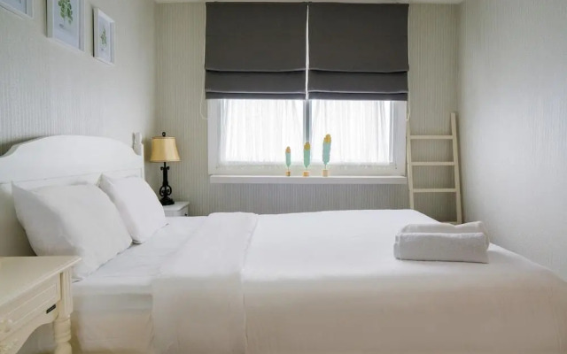 Elegant 1BR Parahyangan Residence Apartment With Mountain View