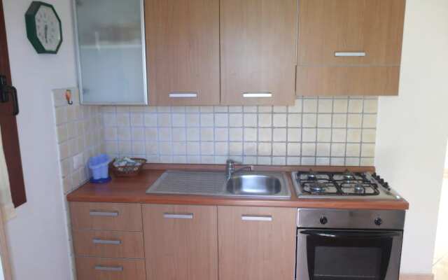 San Teodoro L'Alzoni Apartments