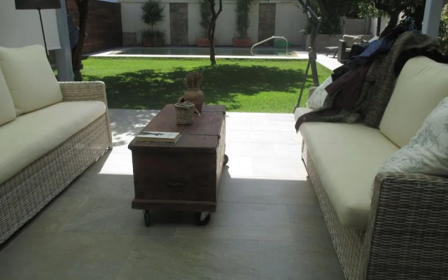 Apartamento Bizcocheros con piscina y jardin