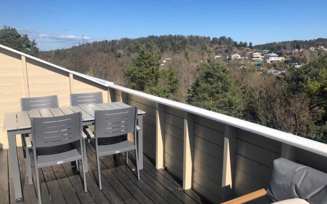 Sentralt rekkehus med solrik veranda!