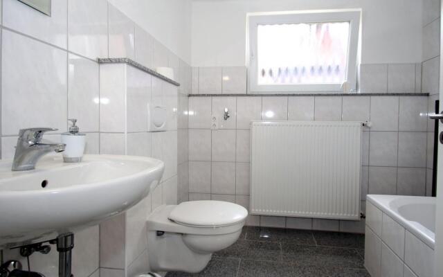 Apartment With a High Chair and bed