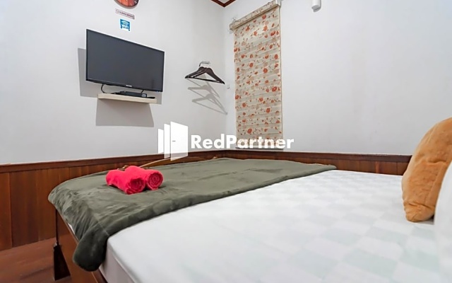 Langkar Guest House Syariah RedPartner – Guest Rooms – Samarinda