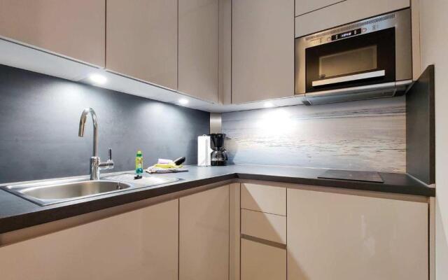 Ferienwohnung-11-mit-Terrasse-und-Strandkorb-am-Strand-Haus-Hohe-Worth-Duhnen