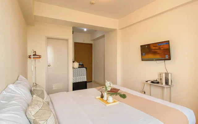 Cozy and Tranquil Studio at Podomoro Golf View Apartment