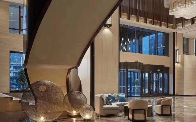 Xinzheng Xingangwanhua Hotel