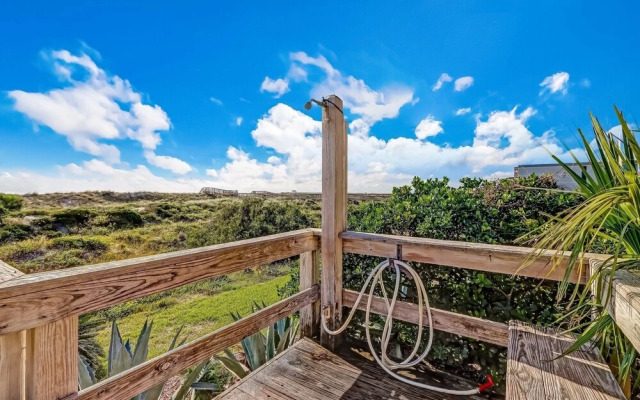 Newly Remodeled Oceanfront Condo with Salt Water Pool and Private Walkway to Beach by RedAwning