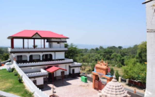 Goroomgo Hotel Aqua Waterfall Dharamsala