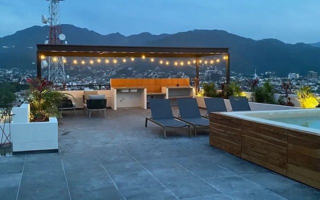 Serene Stylish Stay Roof Pool and Lounge