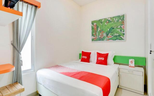 Oyo 90057 Riverside Bali Villas