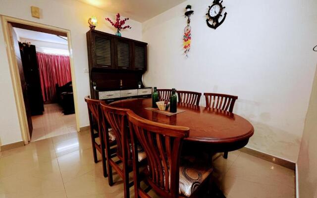 Delightful 2BHK with private veranda in the city.