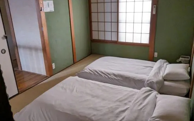 KIX House Waraku III: 5BR Roomshare/Vacation Home Near Kansai Airport – Guest Rooms – Izumisano