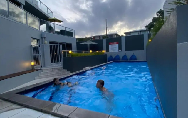 Modern Beach Apartment with Pool & Location