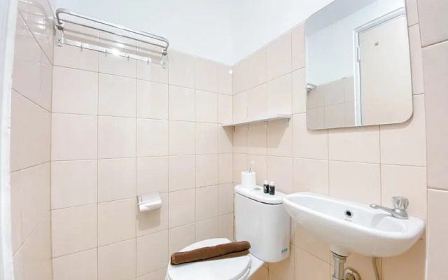 Homey & Restful Studio At Tamansari Panoramic Apartment