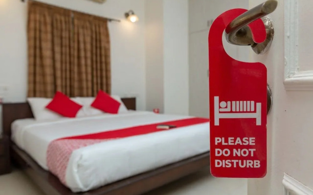 Cute Orange Service Apartments By OYO Rooms