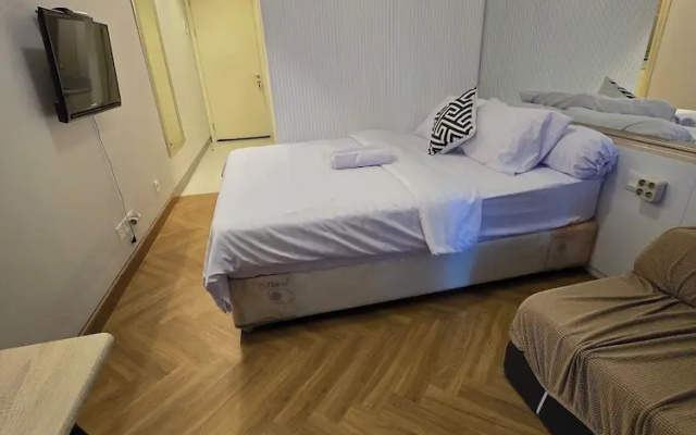 Cosmy Benson 38 Apartment