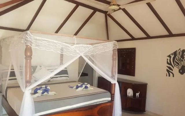 Room in Guest Room - Romantic Room With Access to Beach Ideal for 2 Guests, in Kigomani, Zanzibar
